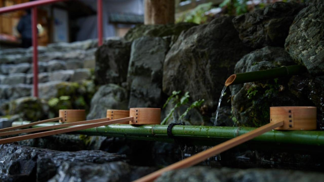 The Thousand Kyoto Exterior photo A tsukubai at a shrine